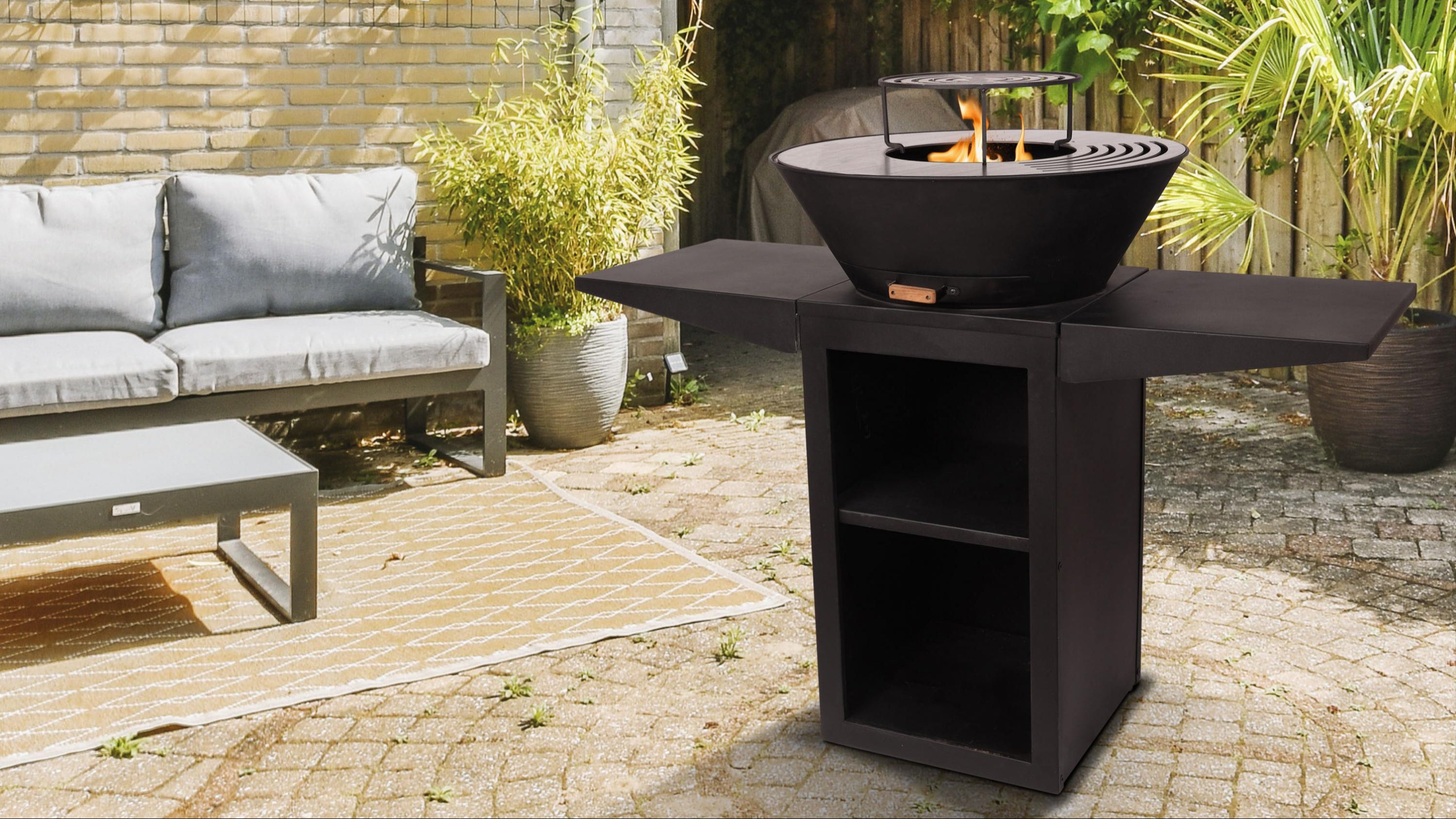 Barbecue avec plaque ronde, grill et support en acier noir