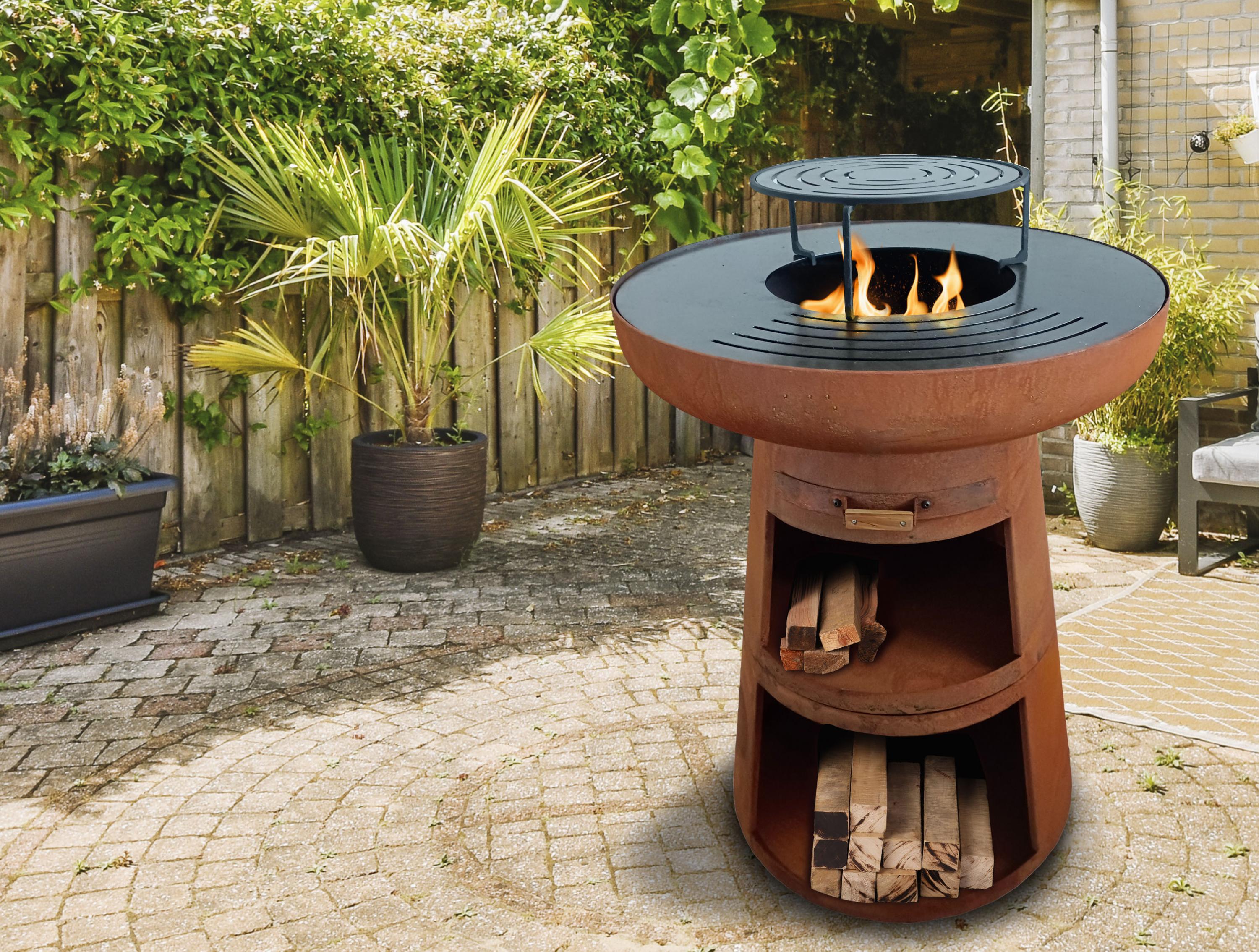 Barbecue rond avec plaque ronde en acier et grille en acier corten